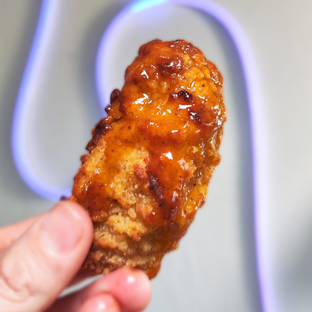 A chicken finger dipped in Danielle Cohn's hot honey.